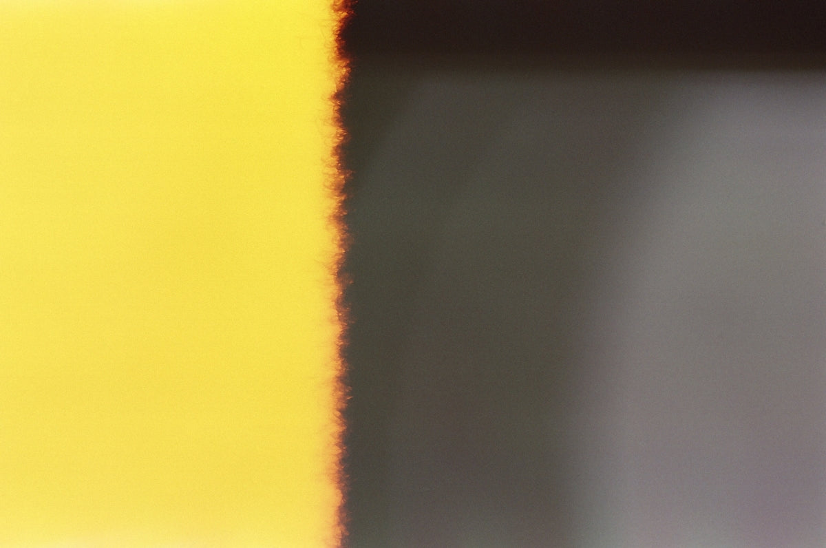 yellow and black striped textile