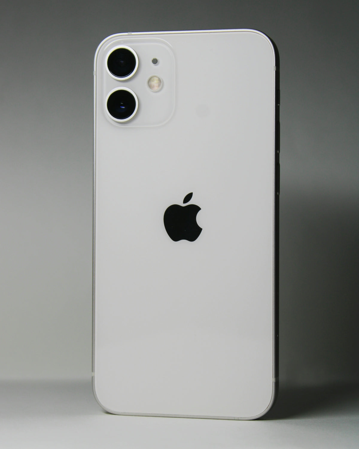 the back of an iphone with a camera on it