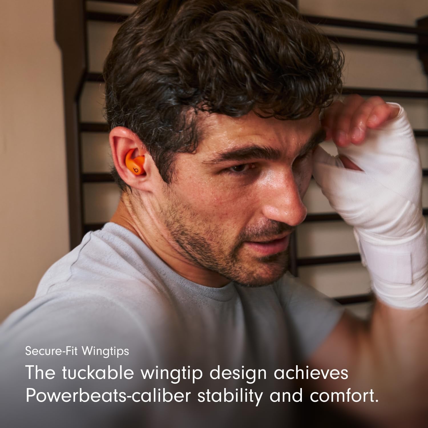 Power Fit - Wireless Noise Cancelling Workout Earbuds with Secure-Fit Wingtips, up to 30-Hour Battery Life, Sweat & Water Resistant, Apple & Android Compatible - Spark Orange
